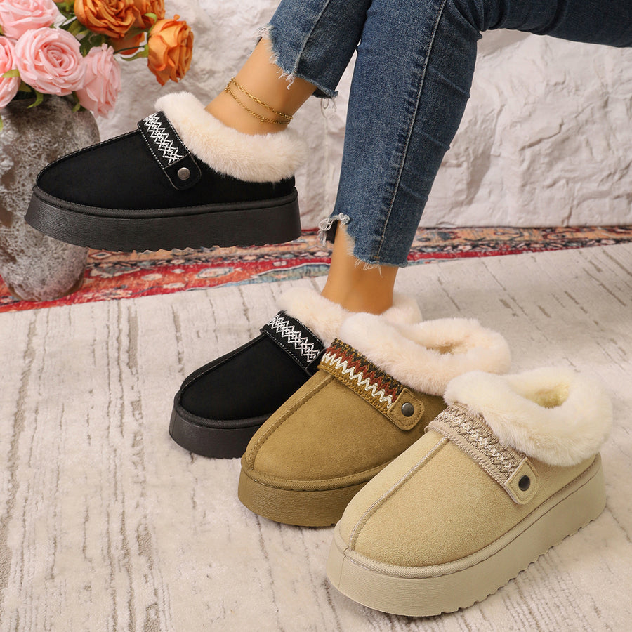 boots in black featuring faux fur lining and platform fit