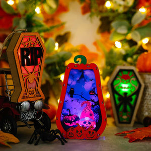 Spooky Silhouette Lantern Trio ornaments with RIP coffin, pumpkin, and gnome designs.