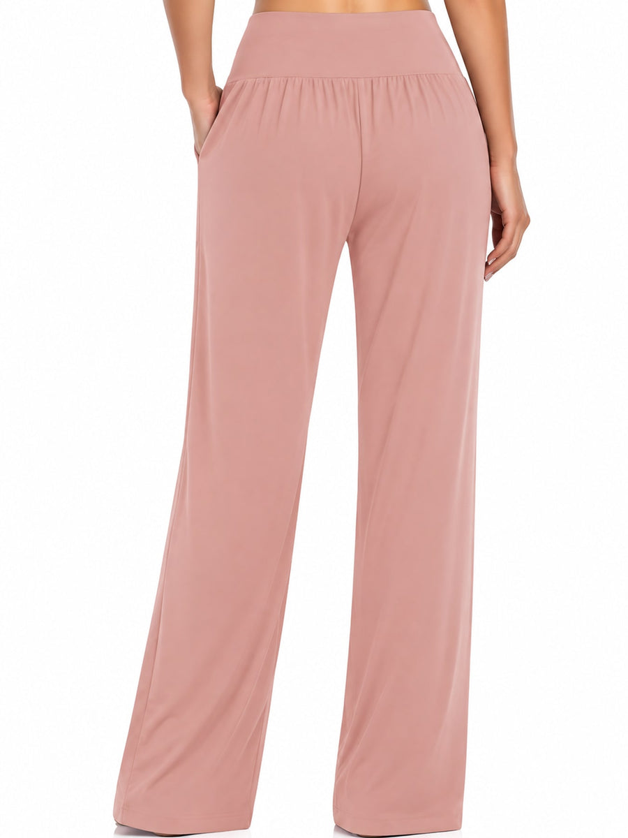 Polyester and spandex blend wide-leg pants in Apricot with relaxed silhouette