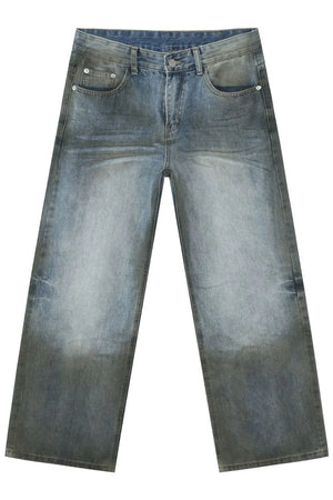 Faded gradient wide-leg jeans in medium wash denim with a relaxed fit.