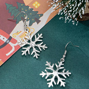 clear earrings featuring dangle and snowflake