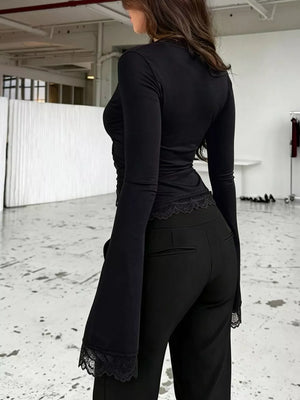 95% polyester, 5% elastane Care instructions: Machine wash cold wrap top in chocolate brown with fitted silhouette