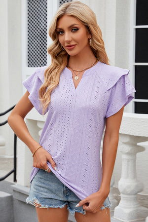 Lavender eyelet blouse with flutter sleeves and v-neck.