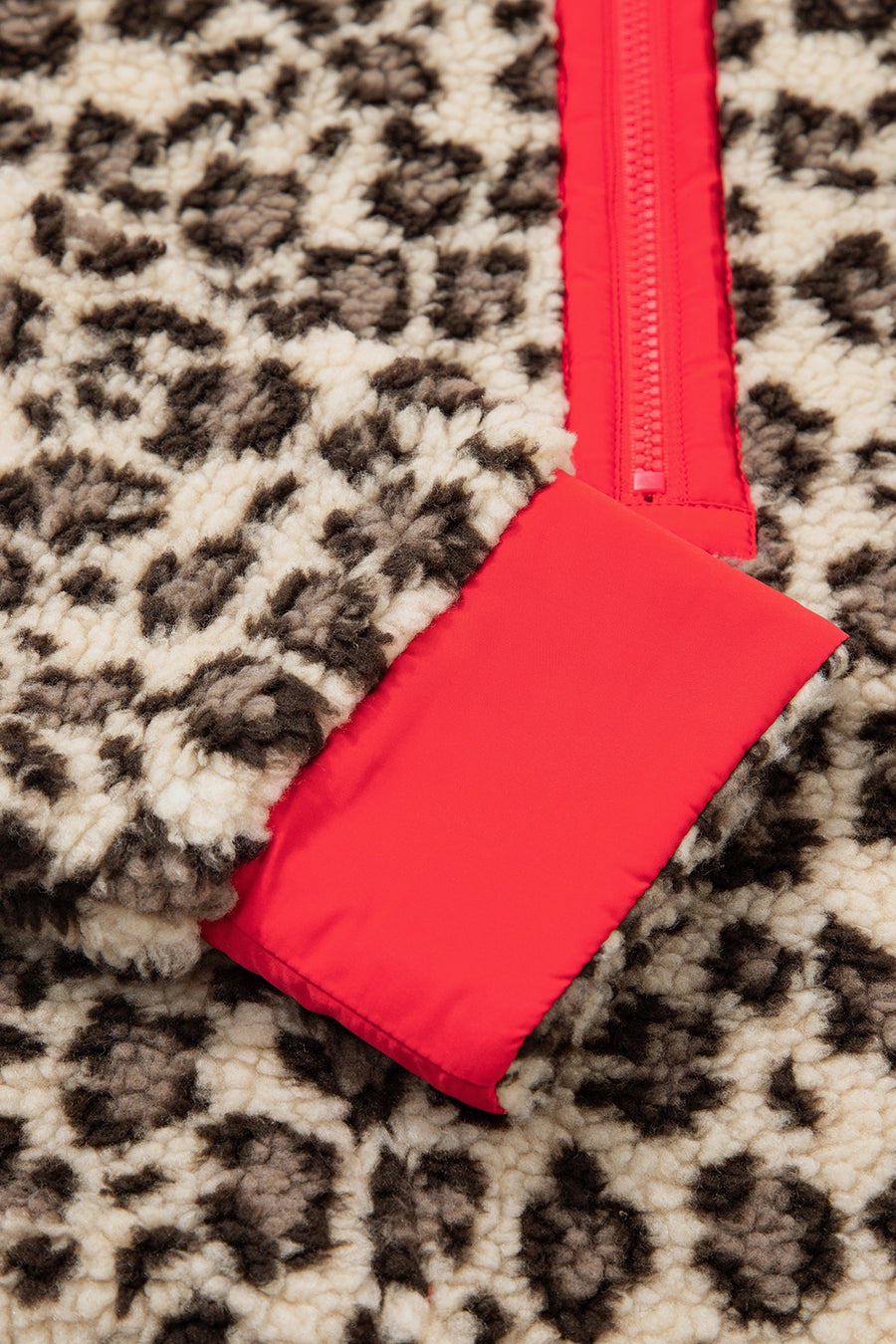 red sweatshirt with hip-length and half-zip