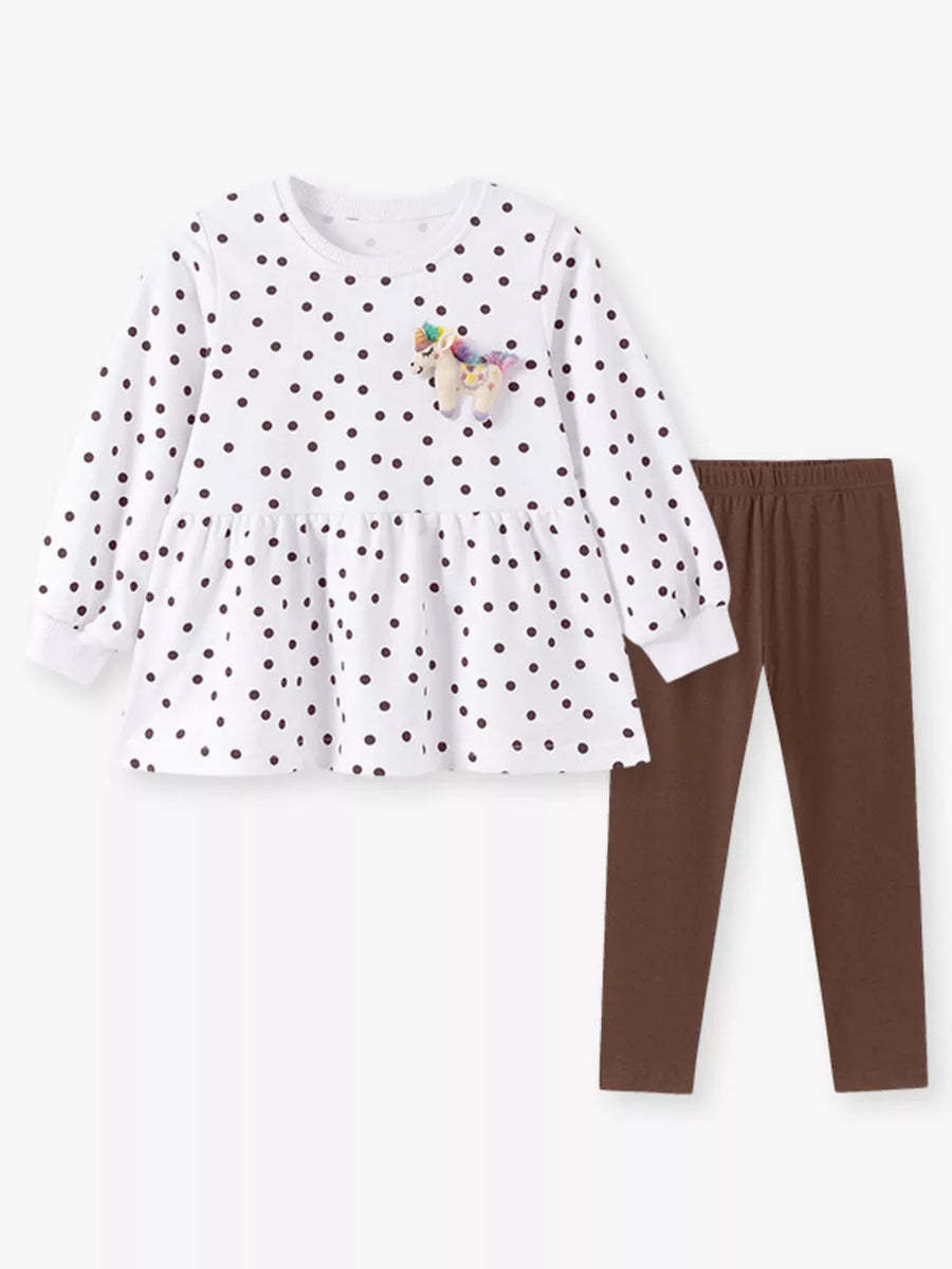 brown peplum top featuring tiered and polka dot