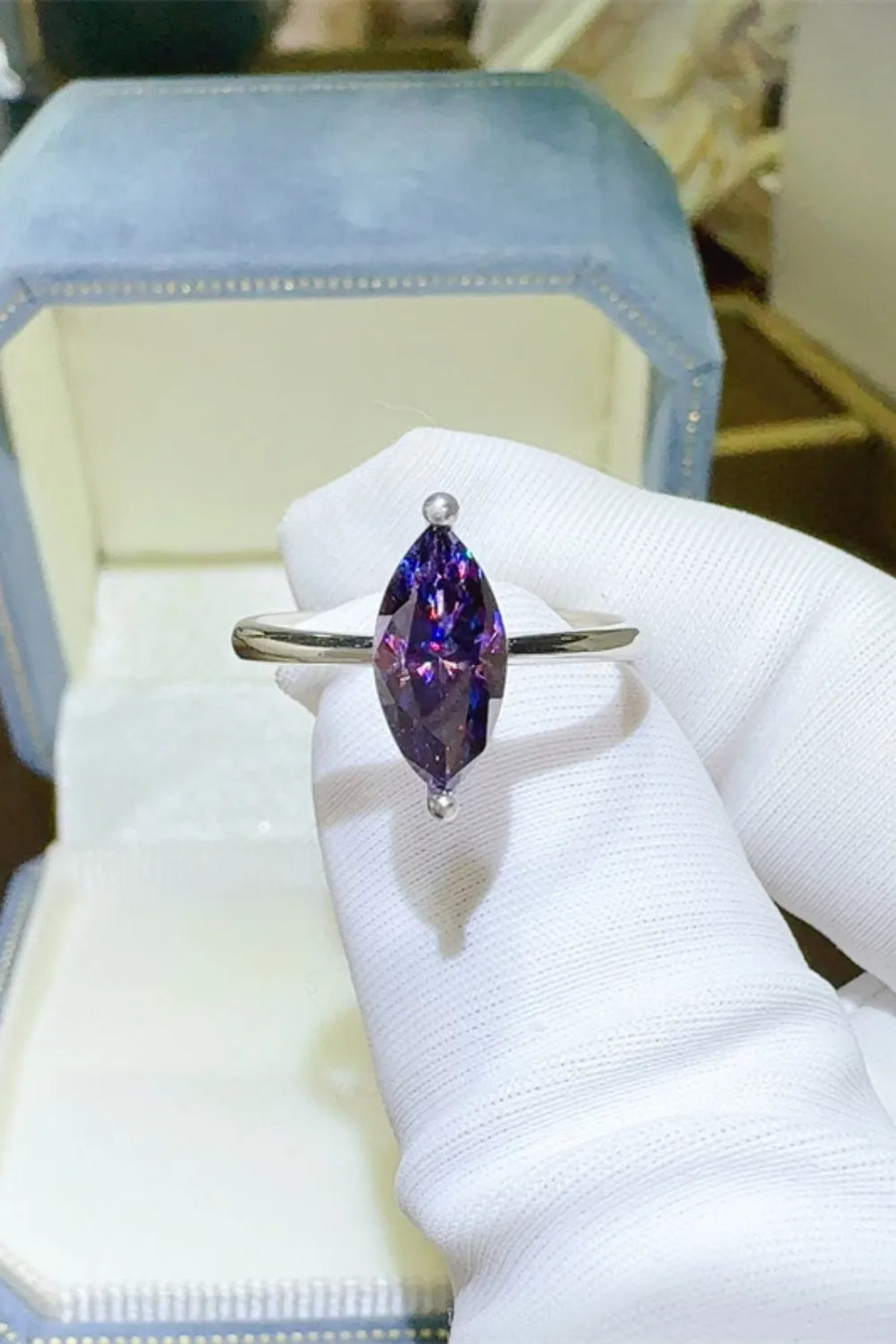 Marquise cut amethyst sterling silver ring with a violet gemstone.