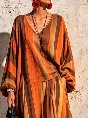 two-piece set featuring striped in Orange with 100% polyester Care instructions: Machine wash cold texture