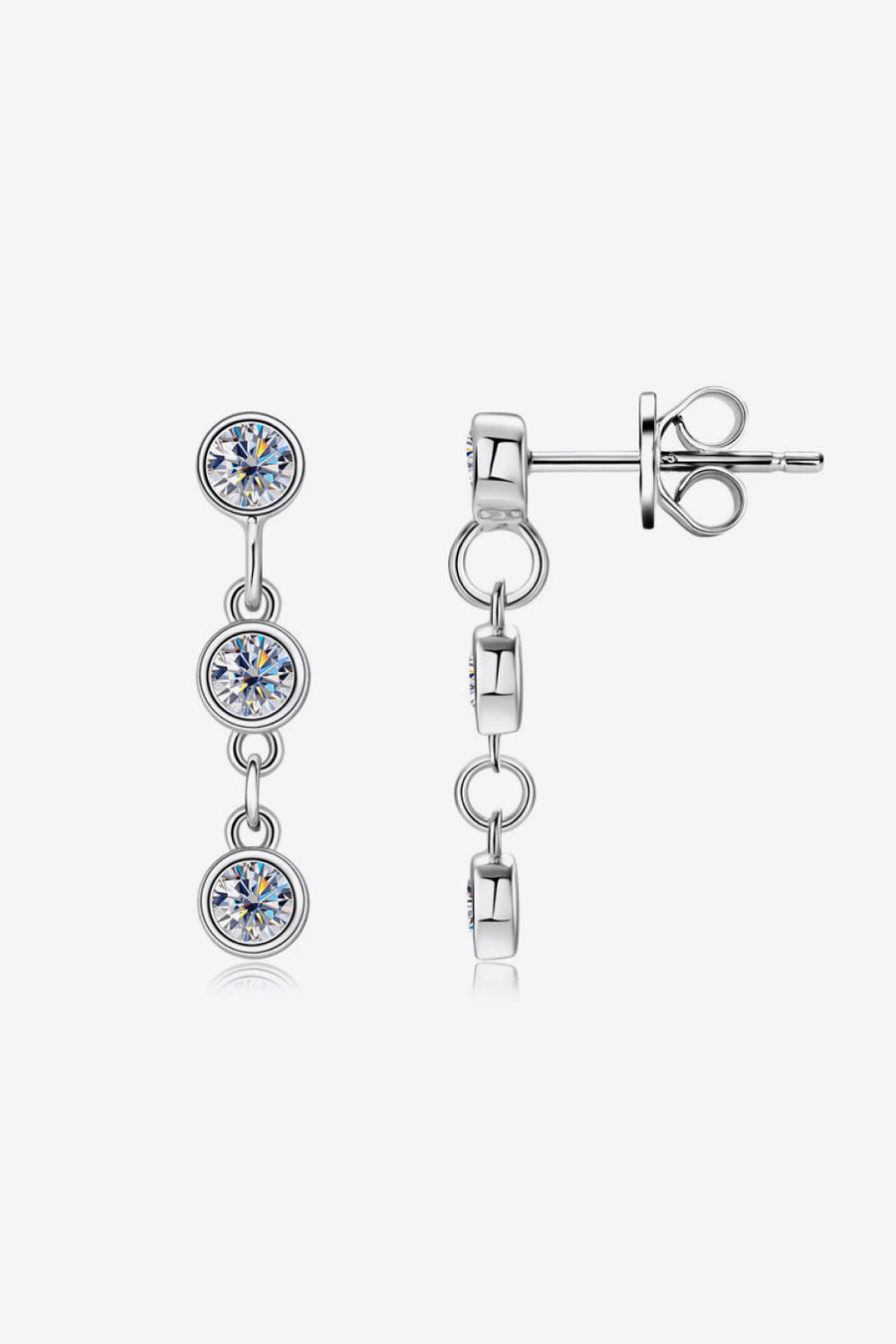 Silver triple stone cascade earrings with clear cubic zirconia.