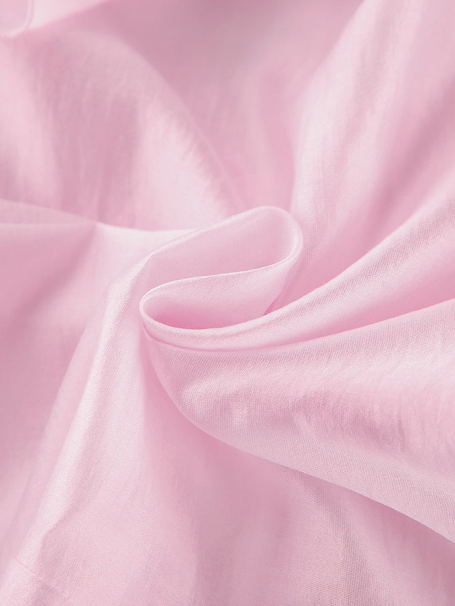 Blush pink long sleeve blouse with ruffle trim detail, casual women's apparel.