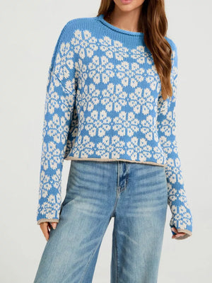 100% Acrylic Care instructions: Machine wash cold pullover sweater in Blue with relaxed silhouette