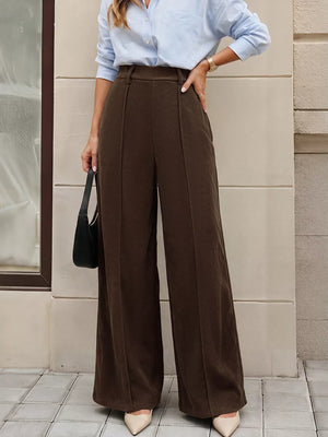 100% polyester Care instructions: Machine wash cold wide-leg pants in dark brown with flared silhouette