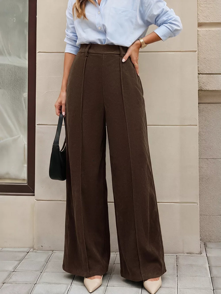 100% polyester Care instructions: Machine wash cold wide-leg pants in dark brown with flared silhouette