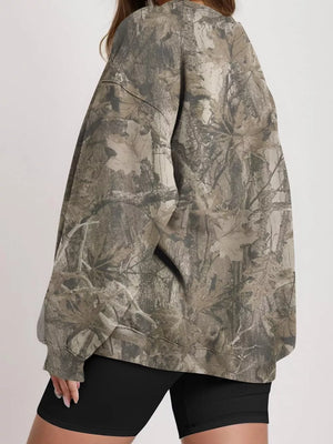 sweatshirt featuring leaf-print in off-white with 95% polyester, 5% elastane Care instructions: Machine wash cold texture