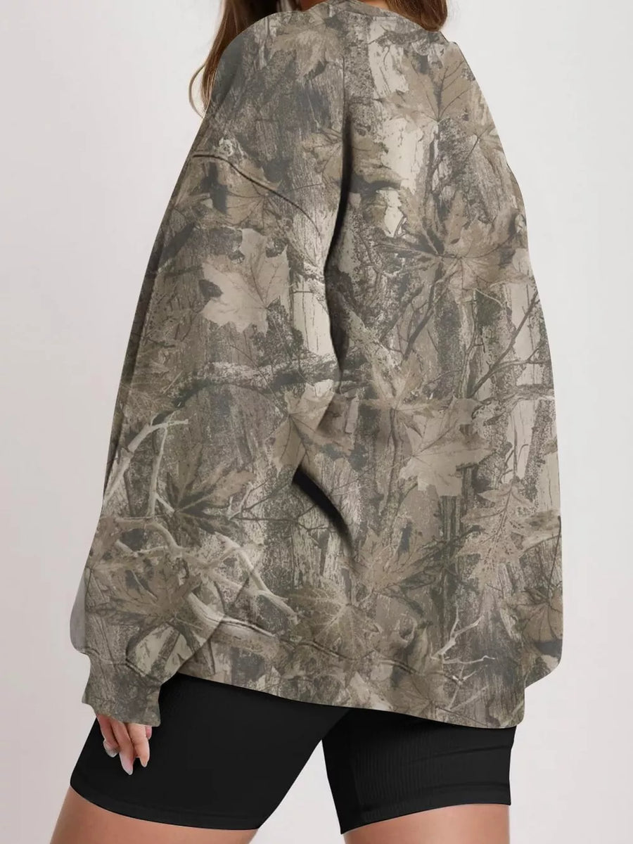 sweatshirt featuring leaf-print in off-white with 95% polyester, 5% elastane Care instructions: Machine wash cold texture