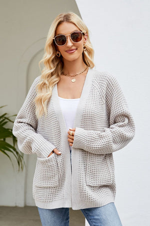 Light Gray waffle knit cardigan with patch pockets and open front.