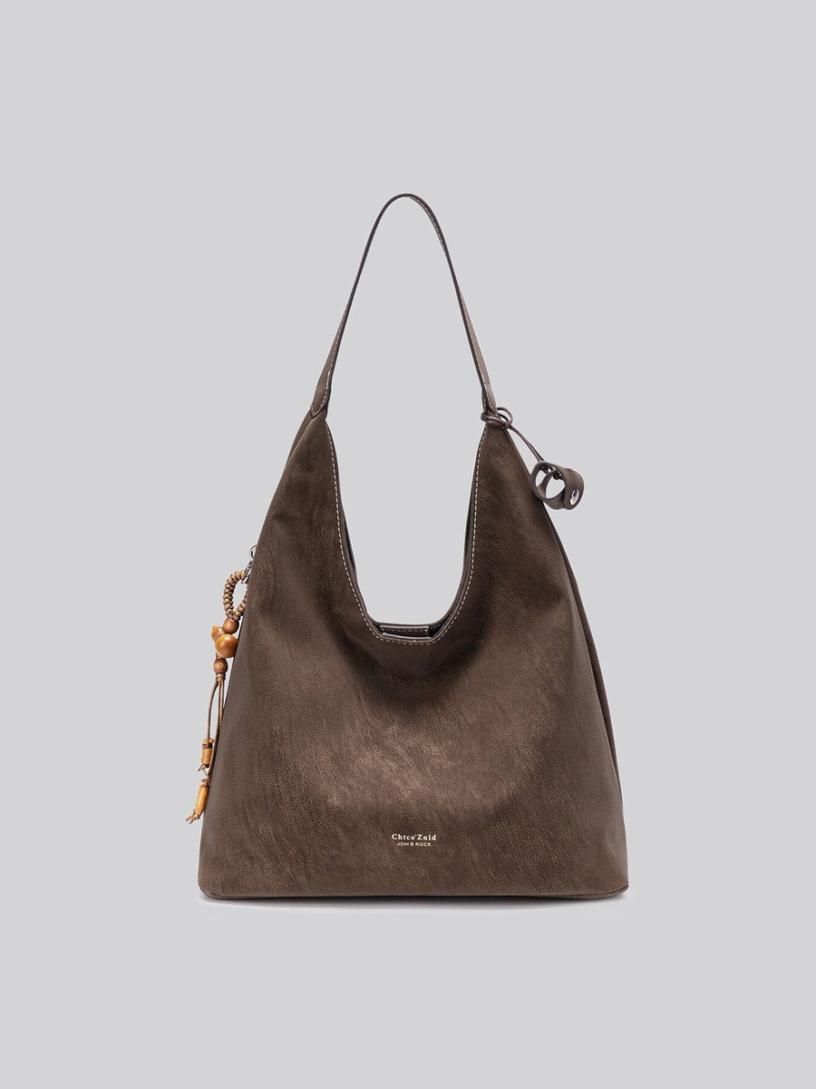 Suede Hobo Shoulder Bag With Tassel in dark brown with decorative tassel