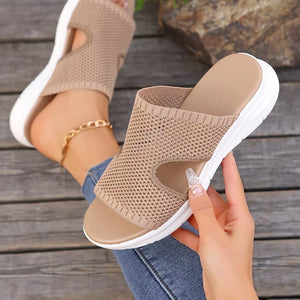 Khaki open-toe mesh sandals with a comfortable slip-on design and white platform sole.