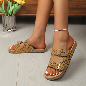 Brown leopard print buckle strap open toe sandals with cork sole.