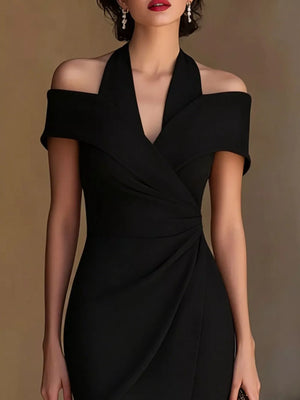Black asymmetrical midi dress with off-the-shoulder neckline and draped detail