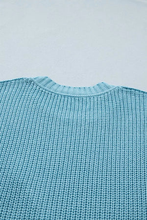 Light blue ribbed knit sweater top with crew neck