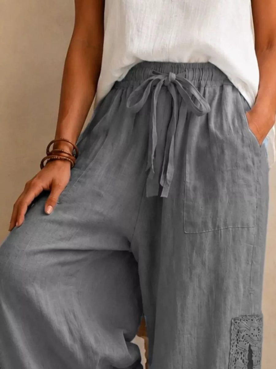 wide-leg pants in Gray with drawstring waist and full-length