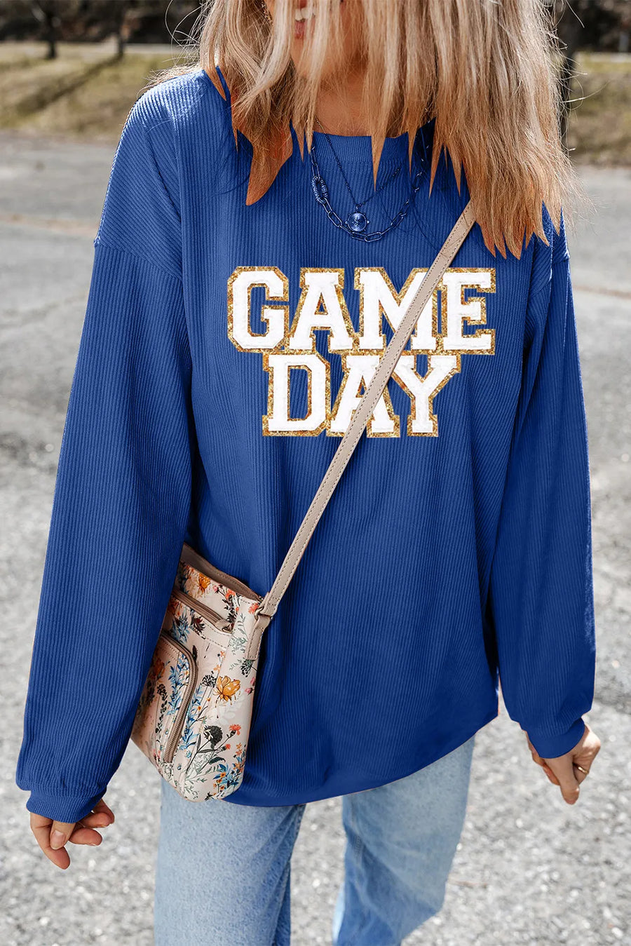 Peacock blue ribbed sweatshirt with white and gold glitter "GAME DAY" graphic.