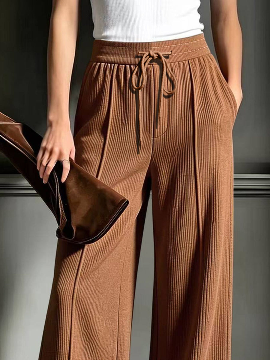 wide-leg pants featuring ribbed in Apricot Color with 100% polyester Care instructions: Machine wash cold texture