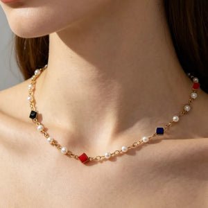 necklace in white with heart and layered