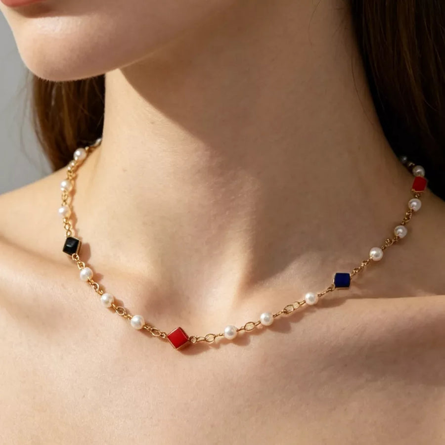 necklace in white with heart and layered
