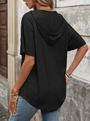 Black relaxed short sleeve hooded t-shirt with a curved hem