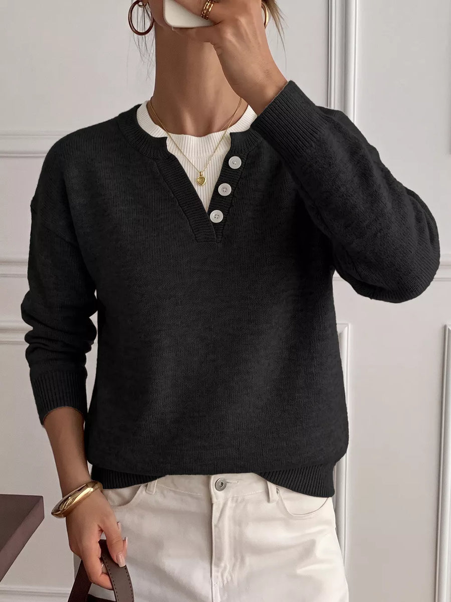 dark brown pullover sweater with ribbed cuffs and long sleeve