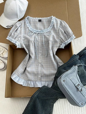 light gray blouse with hip-length and button-front