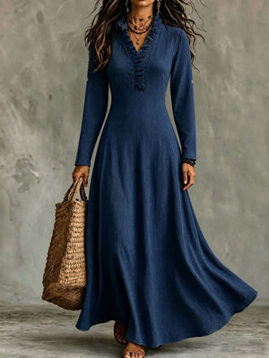 White maxi dress with ruffled and rolled sleeve