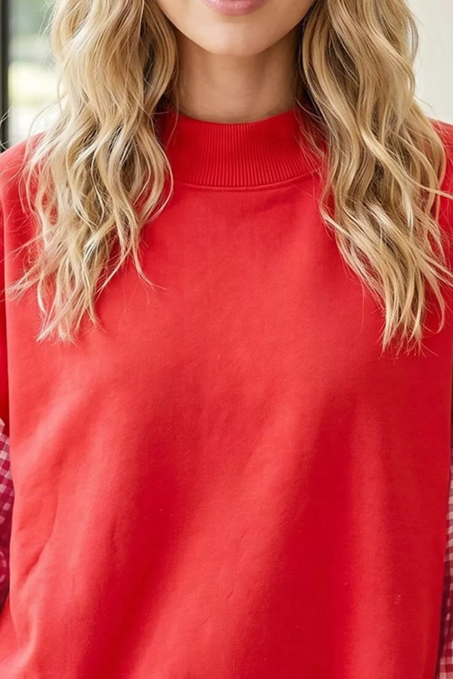 100% polyester Care instructions: Machine wash cold sweatshirt in red with relaxed silhouette