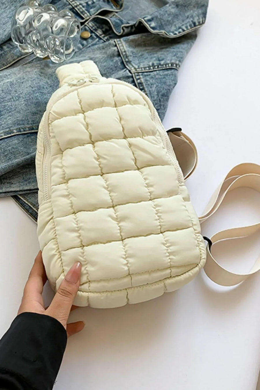 Padded sling bag in Ivory with quilted pattern and top handle