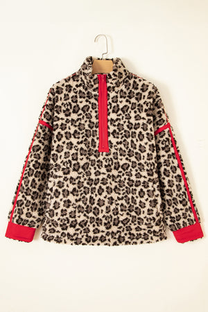 red sweatshirt with half-zip and leopard