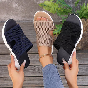 Airy open-toe mesh sandals in khaki, black, and dark blue with comfortable slip-on design.
