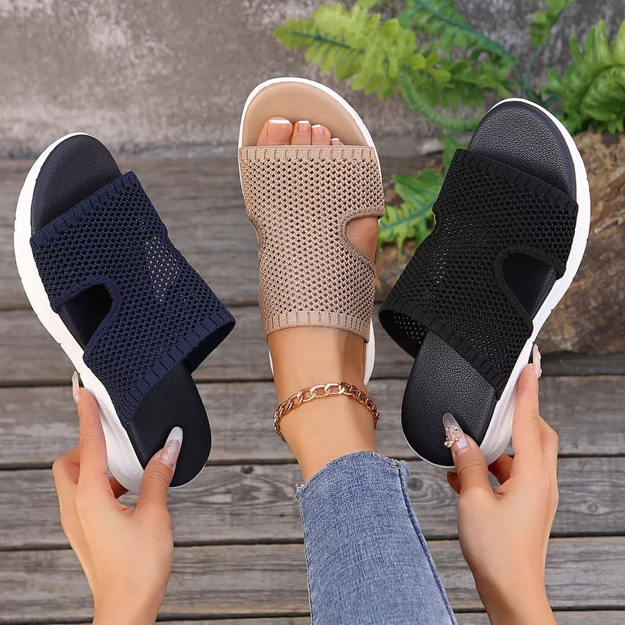Airy open-toe mesh sandals in khaki, black, and dark blue with comfortable slip-on design.