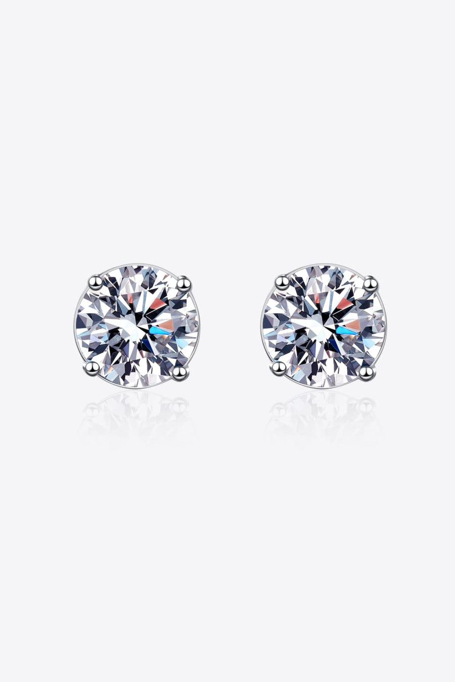 Moissanite solitaire stud earrings with rhodium finish in silver