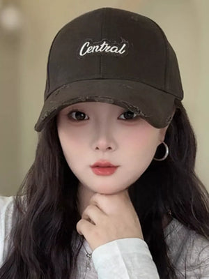 Brown distressed baseball cap with white embroidered "Central" text