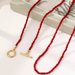 Red necklace with princess length and toggle