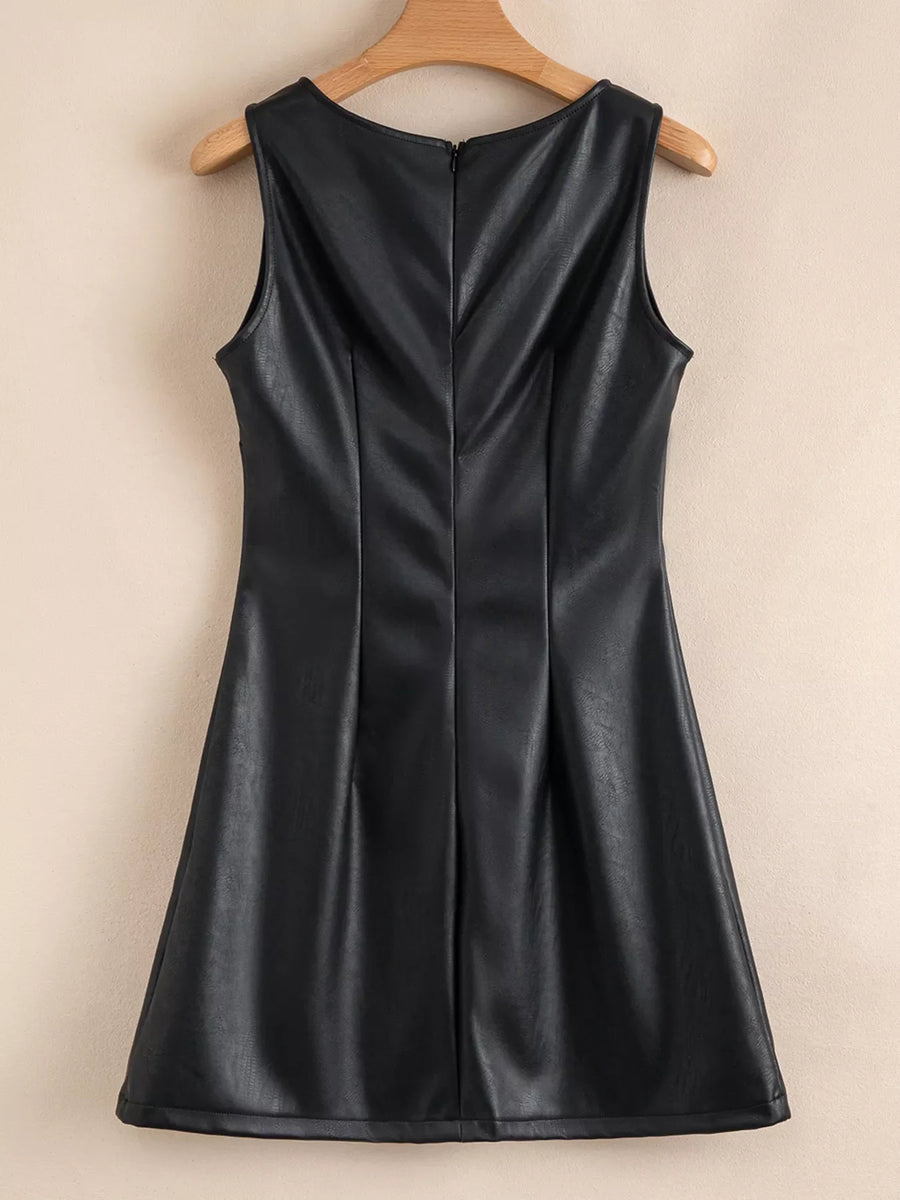 Black vegan leather sleeveless mini dress with a V-neck and a back zipper.