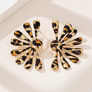 black earrings featuring gold-plated and leopard-print
