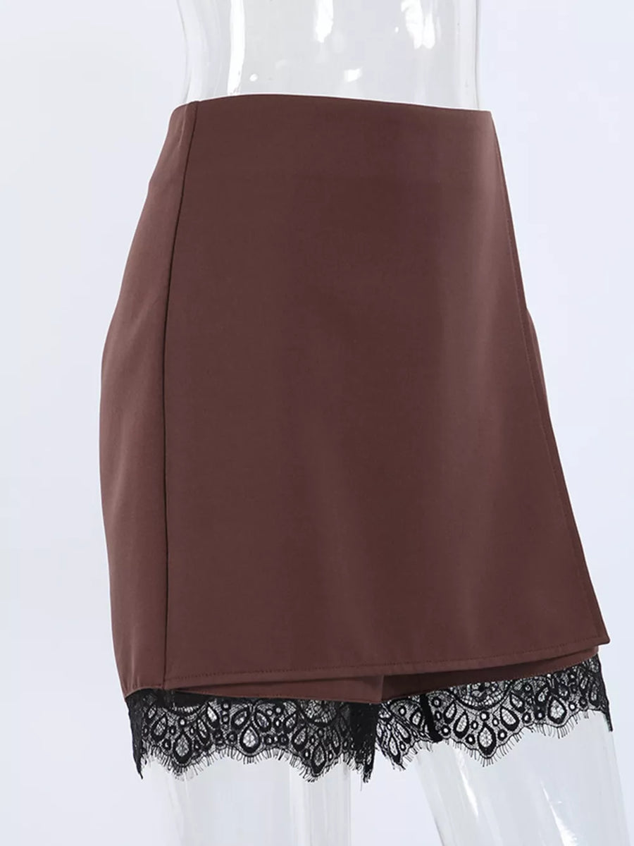 95% Polyester, 5% Spandex Care instructions: Machine wash cold skort in black with straight silhouette