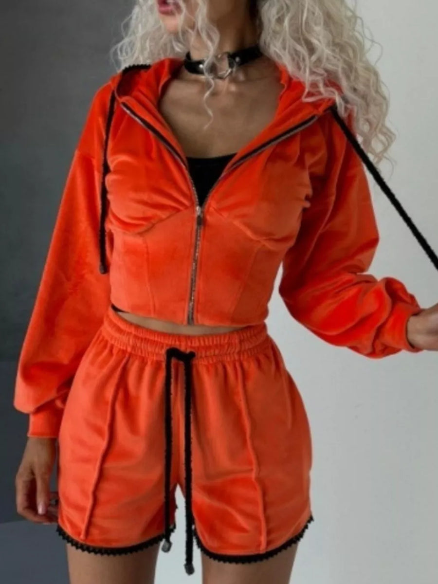 100% polyester Care instructions: Machine wash cold zip hoodie in Orange with relaxed silhouette