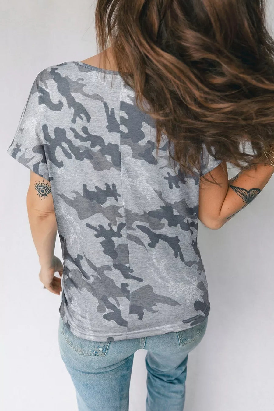 Grey camo print t-shirt with crew neck and short sleeves.