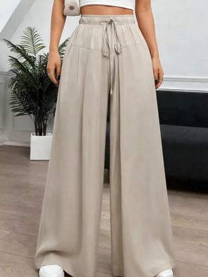 100% polyester Care instructions: Machine wash cold wide-leg pants in light beige with wide-leg silhouette