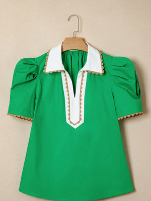 Green cotton blouse with white collar, ricrac trim, and puff sleeves.
