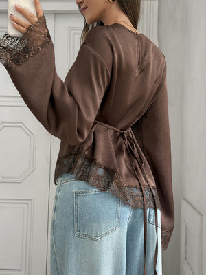 100% polyester Care instructions: Machine wash cold blouse in Brown with relaxed silhouette