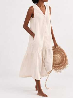 Creamy-white midi dress with buttoned and sleeveless